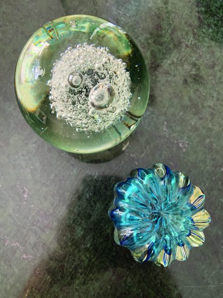 The author’s collection of Murano glass paperweights enlivens her home.