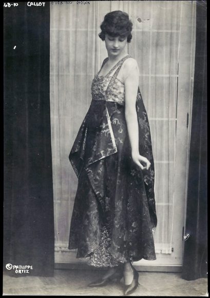 Model wearing the “Déesse” dress by Callot Sœurs, shown at the “Fête Parisienne” in New York, 1915. Photographed by Philippe Ortiz. Silver gelatin print. Diktats bookstore. Courtesy Bard Graduate Center Gallery.