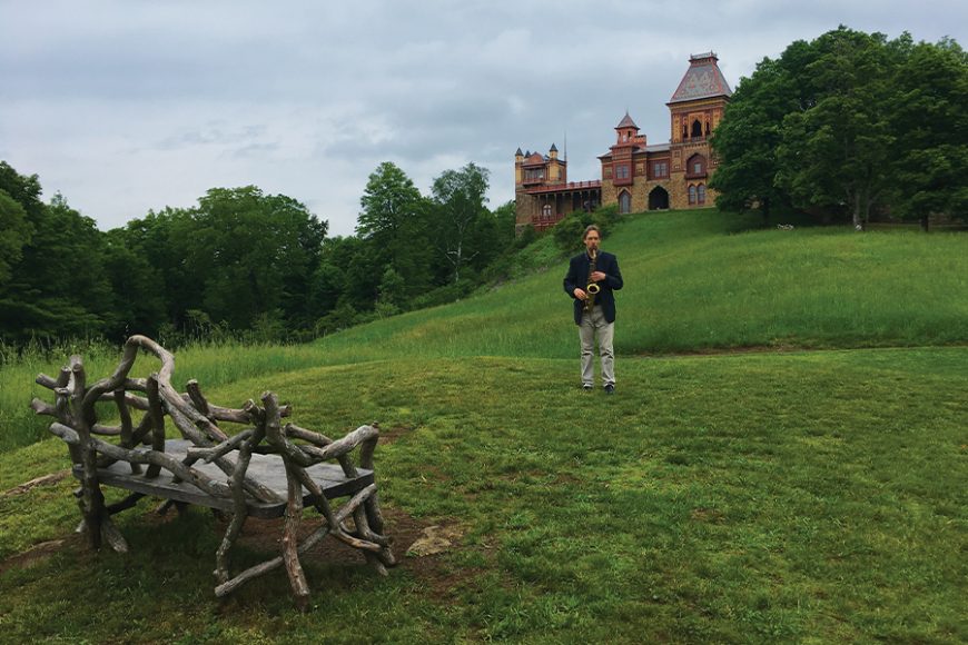 Christopher Brellochs and his saxophone at Olana State Historic Site in Hudson. Photograph by Wade Nobile.