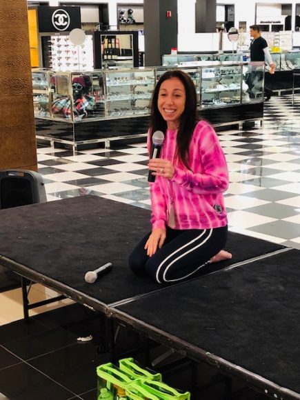 Life Time Athletic instructor and breast cancer survivor Jodi Hurwitz returned to lead last Saturday’s Pink Yoga class at Bloomindale’s White Plains. Courtesy Bloomingdale’s.