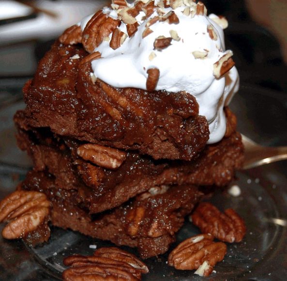 Pecan pie brownies topped with vanilla ice cream and crushed pecans. Photographs by Alexis Michel.