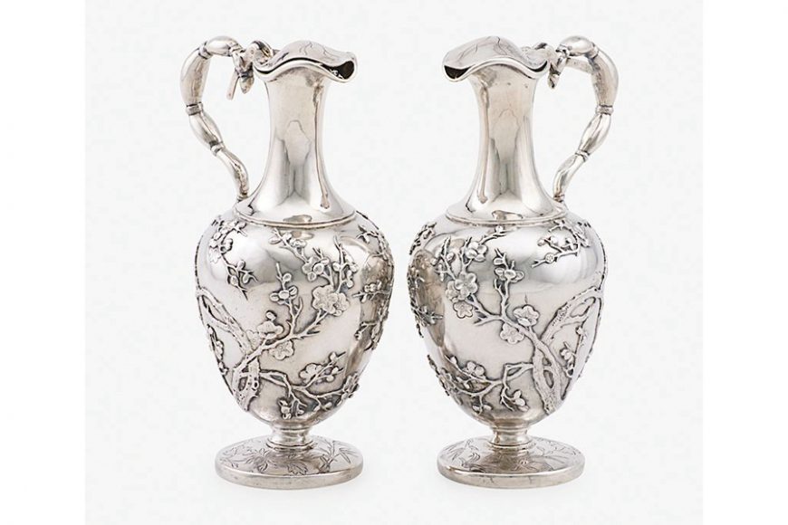 Pair of Chinese export cruets, a rare form, decorated with prunus blossoms, Wang Hing, (late 19th century), 7 ½ inches high, sold for $7,500. Courtesy Rago Auctions.