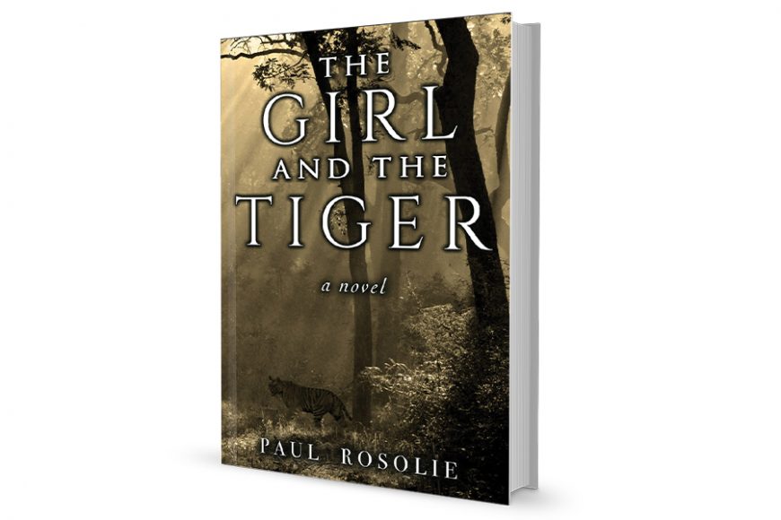 “The Girl and the Tiger,” by Paul Rosolie. 
Cover photograph by Andrew Parker, 
Spectacle Photography UK.