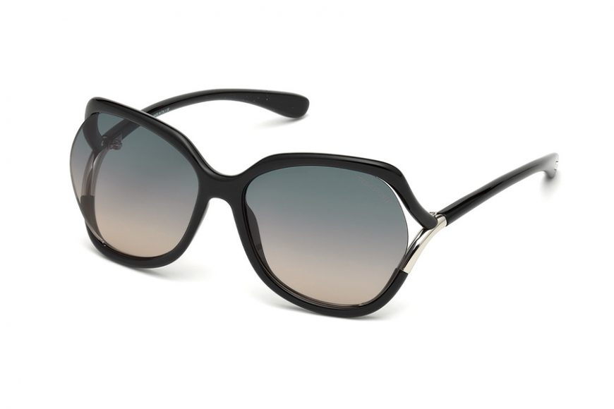 Open-Temple Oval Sunglasses in black/blue. Courtesy Neiman Marcus Westchester. 