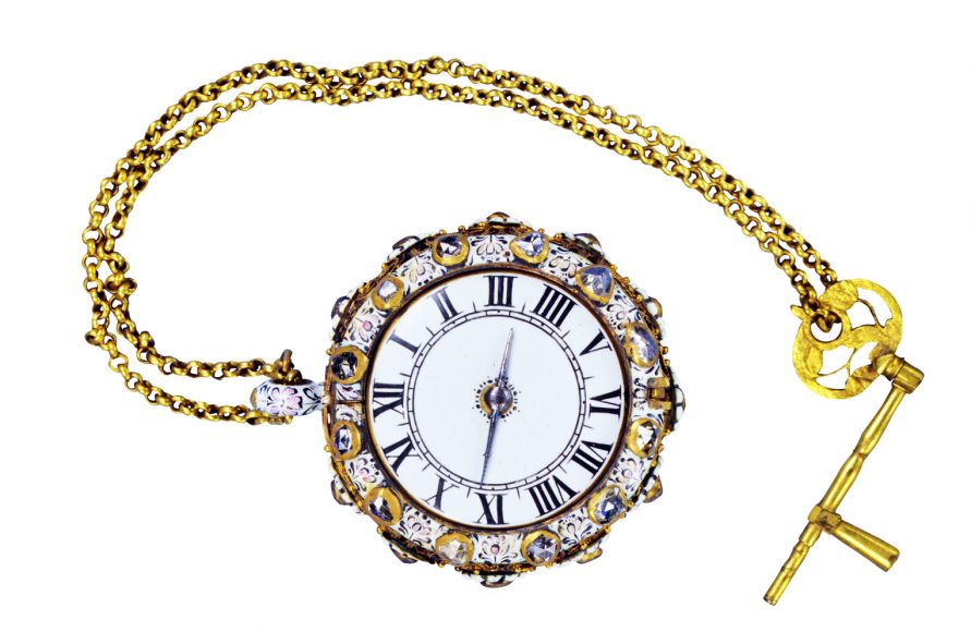 Watch with key, featuring a white dial with Roman numerals. The hinged lid, back and sides are decorated with enameled and diamond flowers amid filigree. Movement signed by J. Thuret of Paris (1660-70). The Royal Danish Collection, Rosenborg Castle, Copenhagen. Photo Kit Weis. Courtesy Thames & Hudson.