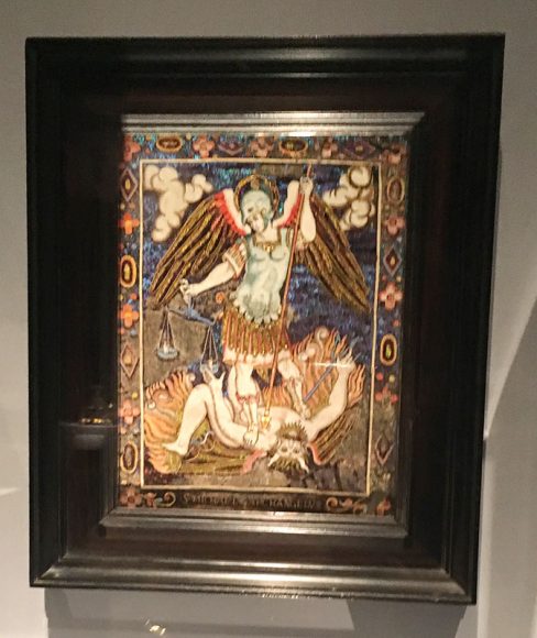 “St. Michael Slaying the Devil,” part of the ingenious “Making Marvels: Science & Splendor at the Courts of Europe” is a “painting” made out of feathers by 16th-century Mexican artists for Emperor Rudolf II. Photographs by Georgette Gouveia