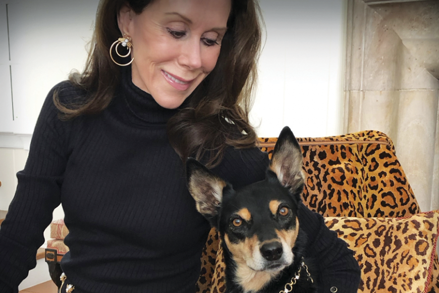 Carolyne Roehm with her Kelpie dog, wearing a Crystal Bee Chain Belt / Necklace and Double Door Knocker Crystal Bee Earrings, with a Crystal Bee Necklace on the dog. Photographs courtesy Carolyne Roehm.