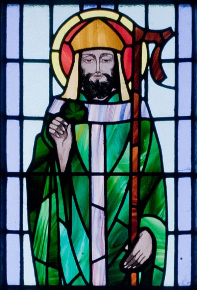 Happy St. Patrick’s Day.  The man himself with two of his attributes, the bishop’s staff and the shamrock, in a stained-glass window in 
St. Benin's Church, Kilbennan, County Galway, Ireland. Photograph by Andreas F. Borchert.
