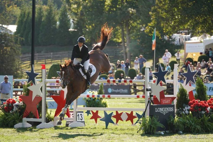 Elizabeth “Beezie” Madden capturing The American Gold Cup last year at Old Salem Farm aboard Garant. Courtesy The Book LLC
