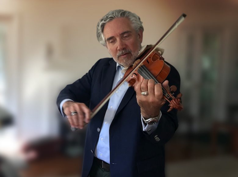 Ezriel E. Kornel, M.D., playing the violin at his Westchester home.Courtesy Ezriel E. Kornel, M.D.
