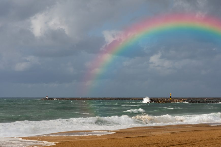 A rainbow appears on a beach in Anglet, in France’s Basque region, after a storm.