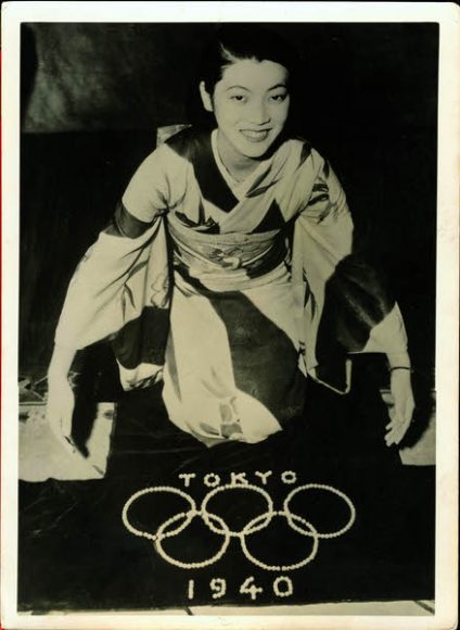 A Japanese woman celebrating Tokyo receiving the 1940 Tokyo Olympics. Courtesy Edo-Tokyo Museum.