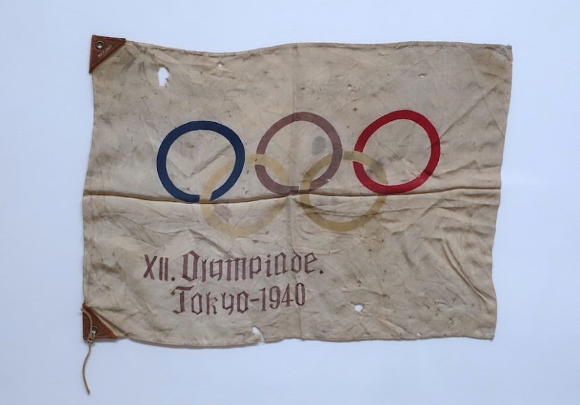 A souvenir hand flag for an event that never took place.  Courtesy Daderot / Creative Commons.