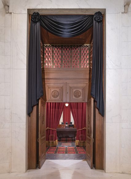 The courtroom doors of the United States Supreme Court are draped in black Sept. 19 in tribute to the late Associate Justice Ruth Bader Ginsburg. Fred Schilling, Collection of the Supreme Court of the United States.