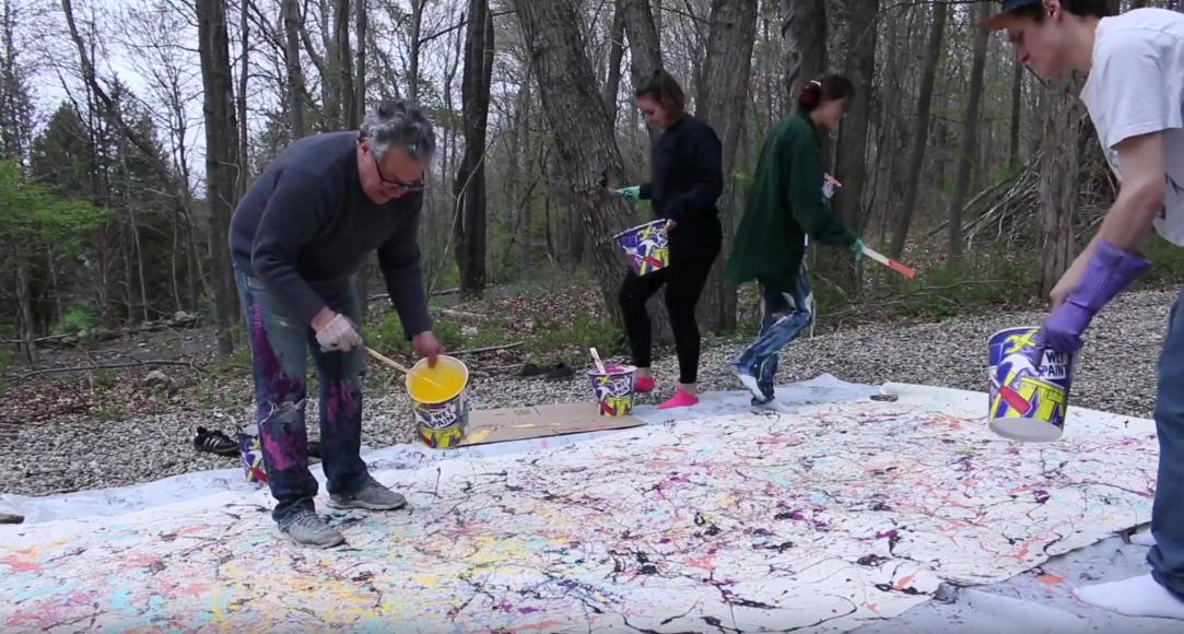 Trace Burroughs leading a pre-Covid-19 abstract painting project.  Courtesy Westport MoCA.