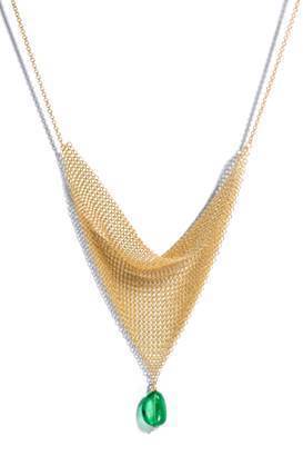 Elsa Peretti's Mesh triangle necklace in 18-karat yellow gold with a tumbled bead emerald, available in three sizes ranging from 5 to 7.99 carats. Image courtesy Tiffany & Co.