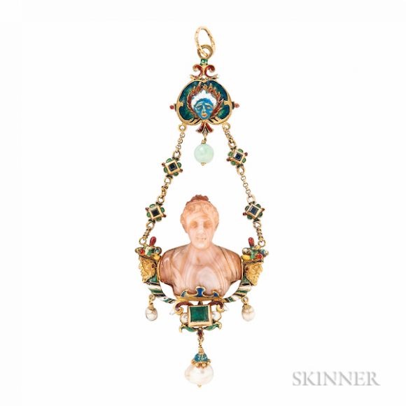 A Renaissance Revival gold and hard-stone cameo pendant, centering a full-relief hard-stone carving of a classical goddess, with foil-back emerald, sapphires, pearl drops, grotesque and cornucopia motifs and counter enamel. Sold for $5,228 at Skinner Inc.