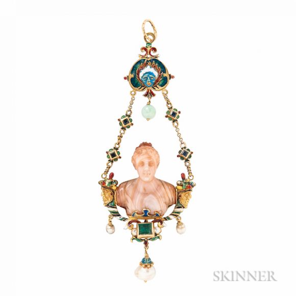 A Renaissance Revival gold and hard-stone cameo pendant, centering a full-relief hard-stone carving of a classical goddess, with foil-back emerald, sapphires, pearl drops, grotesque and cornucopia motifs and counter enamel. Sold for $5,228 at Skinner Inc.