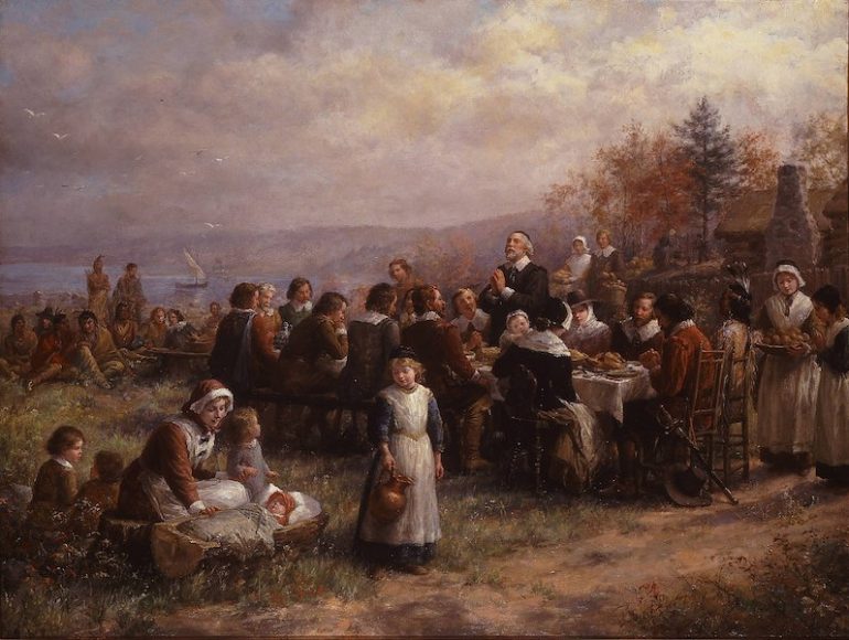 A 1925 recreation of Jenna Augusta Brownscombe's earlier 1914 painting of the “First Thanksgiving at Plymouth,’” which omits the Plains Indian headdresses that were criticized as historically inaccurate in her 1914 version. Today, the painting would be criticized for marginalizing the Native Americans. (In both works, they are secondary to the main action.) National Museum of Women in the Arts.