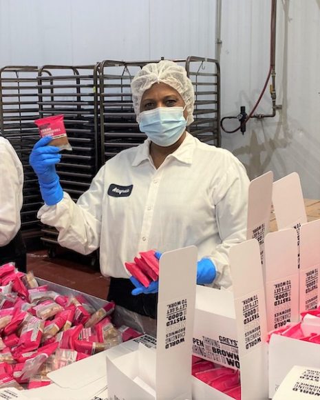 Altagracia Garcia at work, Greyston Bakery. Photograph by Olivia Halligan.