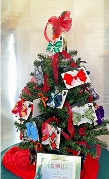 Tie a Festive Ribbon ’Round the Christmas Tree is one of the fanciful trees you can still bid on in “Antiquarius’” second annual “Festival of Tabletop Trees,” through Saturday, Dec. 5.  Courtesy Greenwich Historical Society.