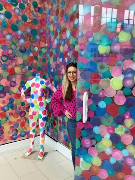 Marla Beth Enowitz and her latest mural, “Gumballs,’ at The Westchester. Courtesy Marla Beth Designs.