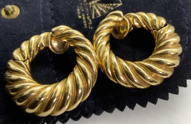 A pair of vintage Van Cleef & Arpels 18-karat gold rope hoop earrings ($1/4,000) has the Van Cleef & Arpels maker’s and workshop hallmarks. Photographs courtesy The Benefit Shop Foundation.