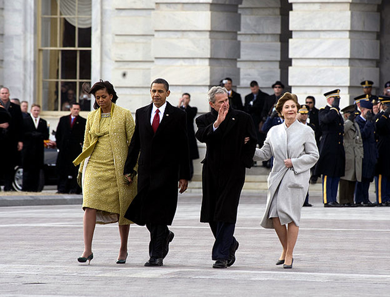 President Barack Obama and first lady Michelle Obama escort former President George W. Bush and former first lady Laura Bush to a waiting helicopter on Inauguration Day, Jan. 20, 2009. Photograph by Chad J. McNeeley. 