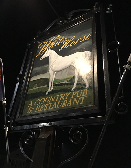 The White Horse pub sign. Photograph by Jeremy Wayne.