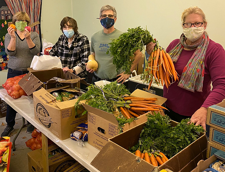 Dobbs Ferry Pantry volunteers. From left to right:  Eden Anker, Ellen Klein, Marcelo Taiano and Marg Quigley. Courtesy Ellen Crane Photography.