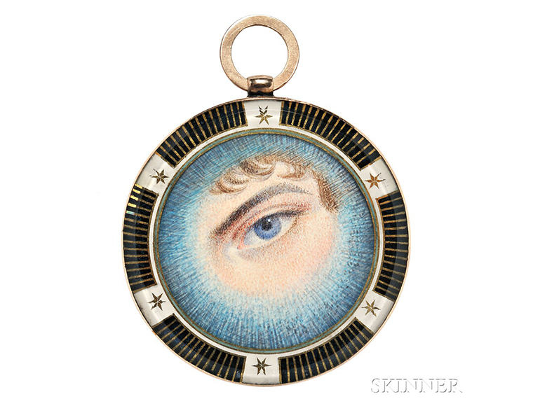 An Antique Eye Miniature Portrait, depicting a blue eye and brown curls, reverse with plaited hair, the border with gilt detail and a gold frame with bail. Sold for $8,610 at Skinner Inc.