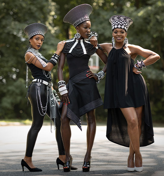 African queens: Zulo basket hats and beaded jewelry, including bib necklaces, create a regal air.  Courtesy Luangisa African Gallery.