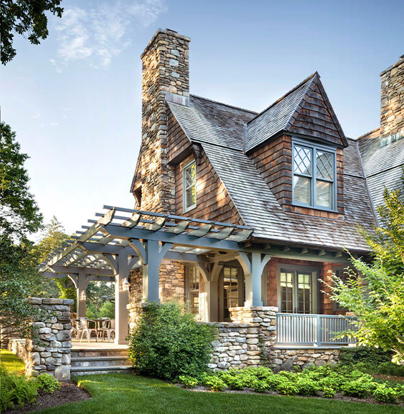 Gambrel shingle-style house by Mackin Architects PLLC. 
Photograph by Scott Francis.
