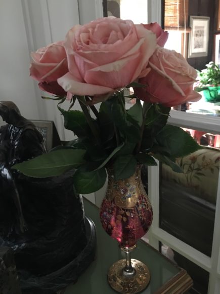 Pink Champagne flutes grace our spring table. Champagne flutes from Crate & Barrel.

Red wine goblets from Williams-Sonoma brighten our botanical kitchen in every season.

A pink floral antique vase from The Rummage Room in Old Greenwich is perfect for peachy pink roses from Wegmans. Photographs by Georgette Gouveia