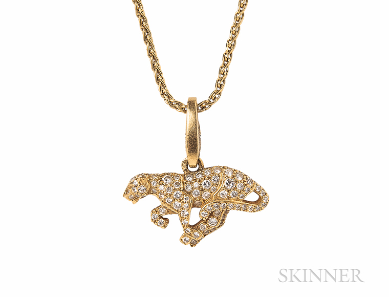 Eight-karat gold and diamond panther charm, Cartier.
Sold at Skinner Inc. for $4,688.
