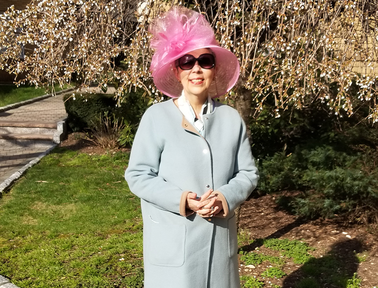 In my Easter bonnet on my favorite holiday/holyday in front of my aunt and uncle’s apartment building in Mount Vernon. Check out the story on the bonnet and the late, lamented Lord & Taylor here. wagmag.com/farewell-to-lord-taylor-2. Photograph by Gina Gouveia.