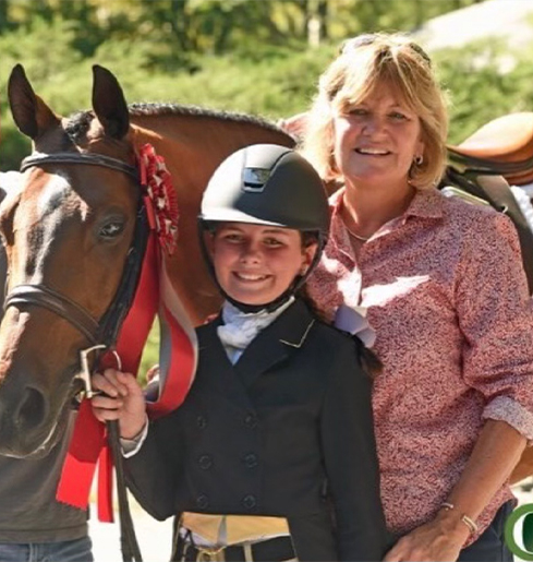 Rider Baylee McKeever with mom Erica, who says: "Baylee was born and raised at Castle Hill Farm. Now 16 years old, she definitely has the bug that I also had from a young age. Being together from ponies to now into the horses, it's been a passion for both of us. Horses are a way of life for us.  We are so lucky to be able to do the horses together as a family."