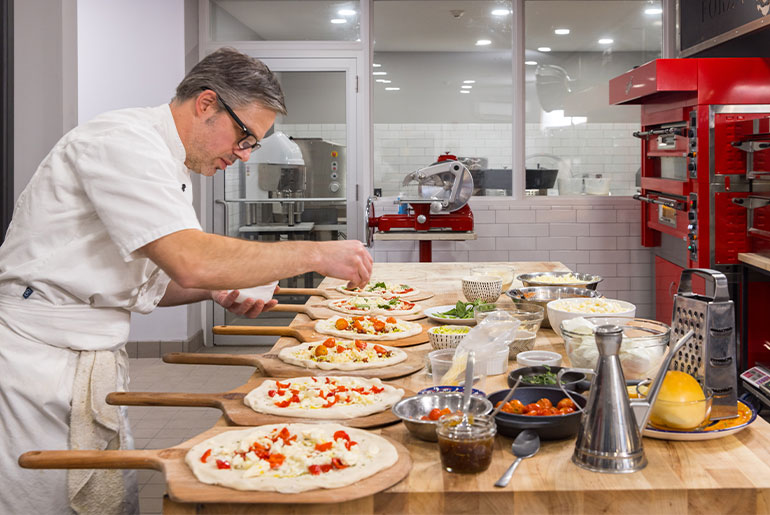 Mark Hopper, culinary director of Forza Forni, in the test kitchen. Photograph by Laura Giarratano.
