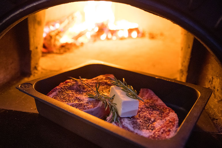 Steak ready for the wood-fired oven. 
Photographs courtesy Forza Forni.