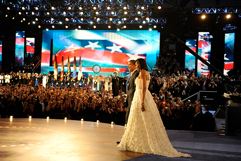 Michelle Obama’s toned arms – seen to good advantage in the Jason Wu goddess gown she wore to husband Barack Obama’s first presidential inauguration – have inspired women to take to the gym and plastic surgery. Photograph by Tech Sgt. Suzanne Day, USAF.