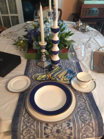 Summer is the perfect time for blue-and-white fashion and home décor. Our summer dining room table, inspired by Ned Kelly & Co.’s designs for Caramoor’s Juneteenth opening night gala, features heirloom linens, Wedgwood Palatia and Renaissance Gold dinnerware, napkin rings by Oscar de la Renta, candlesticks from Williams-Sonoma and the New York Botanical Garden and hydrangeas from Wegman. Photographs by Georgette Gouveia.