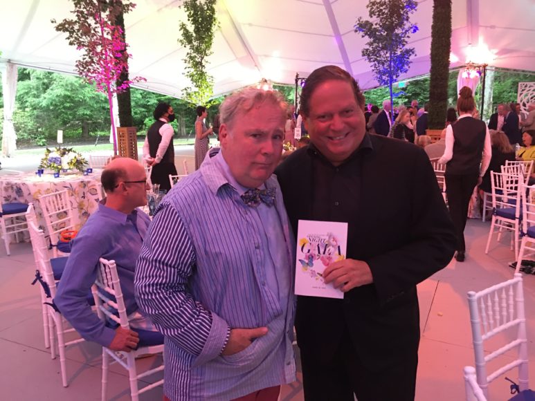 For Caramoor’s opening night gala on Juneteenth, Ned Kelly (left) did the stunning blue and white décor, prefiguring the summer solstice. He’s pictured with former WAG adviser David Hochberg, who holds the gala program, designed by Adam Neumann.