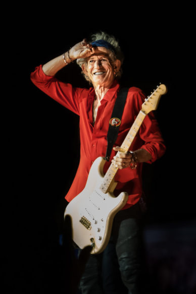 Guitar straps aren’t just for rock greats like Weston’s Keith Richards, seen here in a 2018 photograph by Jerzy Bednarski.