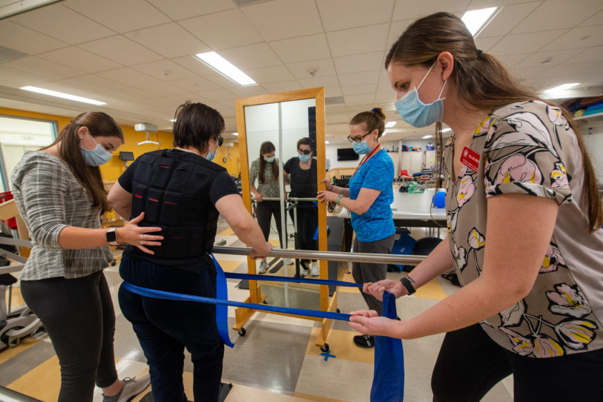 Professor Alicia Spiro and PT students work with a stroke survivor at Sacred Heart University's Center for Healthcare Education. Photo by Tracy Deer-Mirek 5/26/21