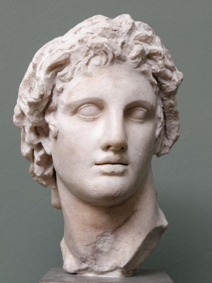 A Roman marble copy of a third century B.C. bust of Alexander the Great, who sports the tousled tresses emanating from the crown popular among young men today. Courtesy Ny Carlsberg Glyptotek, Copenhagen