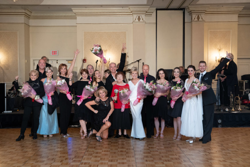 Lucille Pilacamp, 94, surrounded by her fellow dancers as the recipient of the event’s Fan Favorite Award. Photographs courtesy United Hospice.