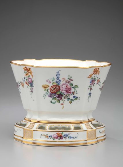 Saying it with ceramic flowers: This Vase or Flower Pot and Stand (Vase Hollandois, first size) (1756, Vincennes, soft-paste porcelain) illustrates the intimate connection between Mme. De Pompadour and the royal factory of Vincennes/Sèvres, which she inspired to produce floral decorative art. Private collection.
