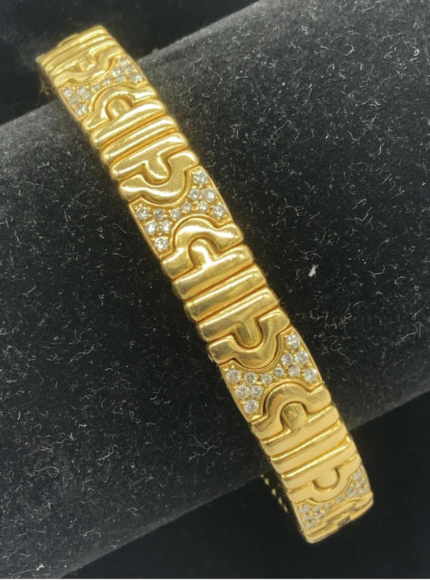 A standout among the jewelry on auction is this Bulgari Parentesi gold and diamond cuff bracelet ($500 to $2,000), featuring interlocking pieces in 18-karat yellow gold and faceted diamonds.  