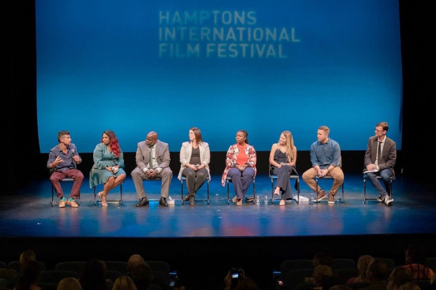 From left: film subjects Karl Arabian, Alexis Ellis, Ahmed Ellis, Kellie Wunsch, Nahalie Douge, M.D., and Jenna Millman, producer-director Matthew Heineman and HIFF Artistic Director David Nugent at the world premiere of National Geographic Documentary Films' '”The First Wave’ at the Hamptons International Film Festival. Photograph by Mark Sagliocco/Getty Images for National Geographic.