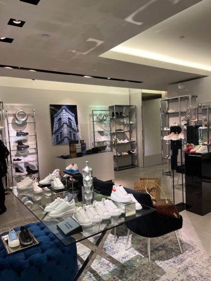 The pop-up on the main floor of Bloomingdale’s White Plains features designer sneakers, slides, sandals and other pool footwear from Alexander McQueen, Balenciaga, Golden Goose and Saint Laurent. Photographs by Georgette Gouveia. 